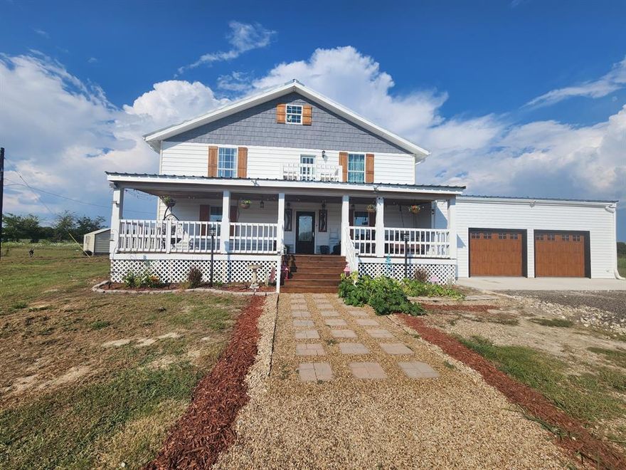 Modern Farmhouse No HOA The perfect blend of luxury, and country charm $10,000 Incentive to use how you see fit. Open-concept layout with soaring ceilings. Gourmet kitchen with massive island, double fridge, built-in microwave drawer, commercial-grade stove. Electric fireplace with real wood beam mantle and ceiling beam. Luxury primary suite and spa-like bathroom featuring a large stone walk-in shower, soaking tub, and double vanities. His & Hers custom walk-in closets. Oversized walk-in pantry. Mudroom and a full guest bathroom. Large landing, 4 spacious bedrooms two with en-suite baths and walk-in closets, private balcony. Large attic space with tall ceilings. Front deck: a bed swing, back deck is perfect for outdoor dining or entertaining. Attached 2-car garage with high ceilings. Detached garage shop. Pond and ample Fully fenced acreage for livestock. Additional electrical and sewer connections ready for a second home.