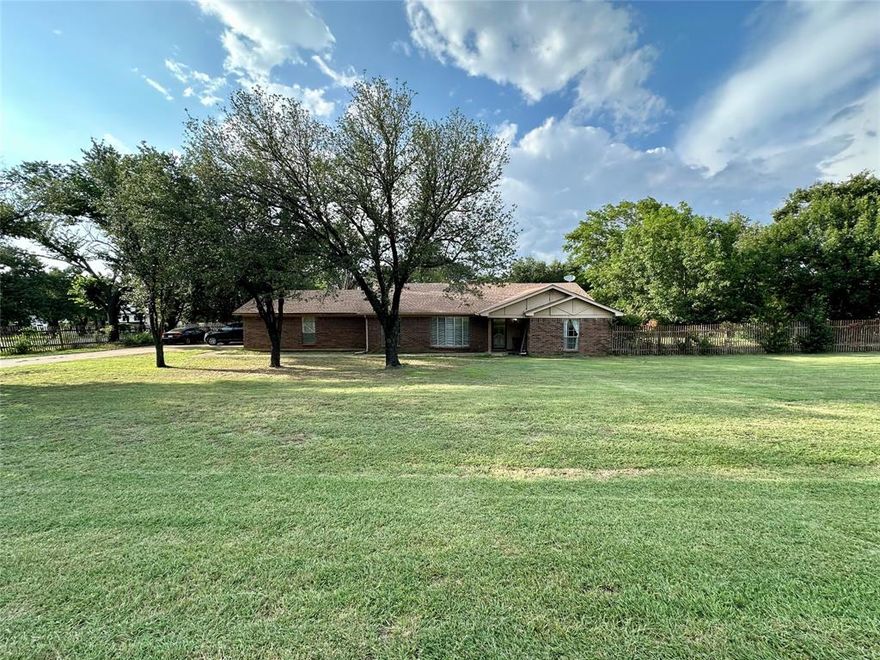 BACK ON MARKET BECAUSE BUYER DID NOT QUALIFY FOR FINANCING - Looking for a home with space between you and neighbors that has room for boats, RV parking, garden and a pool? Well, here it is. Experience the tranquility of country living on nearly an acre, conveniently located in Burleson, TX and just a few minutes from highway I-35. New laminate wood floors are present in the kitchen, living room, and dining area of this residence. The new HVAC unit was installed on September 2019. The new Water Heater install was last year 2024. The living area features a vaulted beamed ceiling with a wood burning fireplace. A septic system is installed on this property. With a little TLC this house can be yours today.
