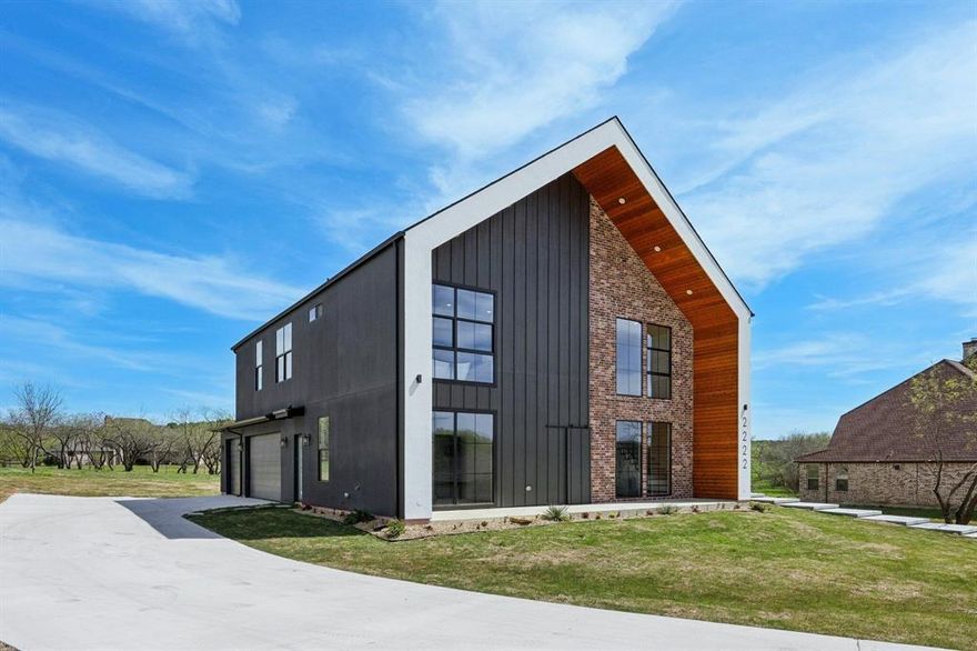 This beautifully designed home showcases timeless architecture paired with modern comfort and functionality. From the moment you arrive, the property stands out with its striking exterior, clean architectural lines, and thoughtfully designed façade that creates exceptional curb appeal.

Inside, the home features an open and airy floor plan enhanced by high ceilings, large windows, and carefully placed architectural elements that allow natural light to flow throughout the space. Elegant details such as decorative trim work, arched openings, and refined finishes add character and sophistication to the interior.

The kitchen serves as the heart of the home, designed with both style and practicality in mind. It features generous counter space, custom cabinetry, and a seamless connection to the