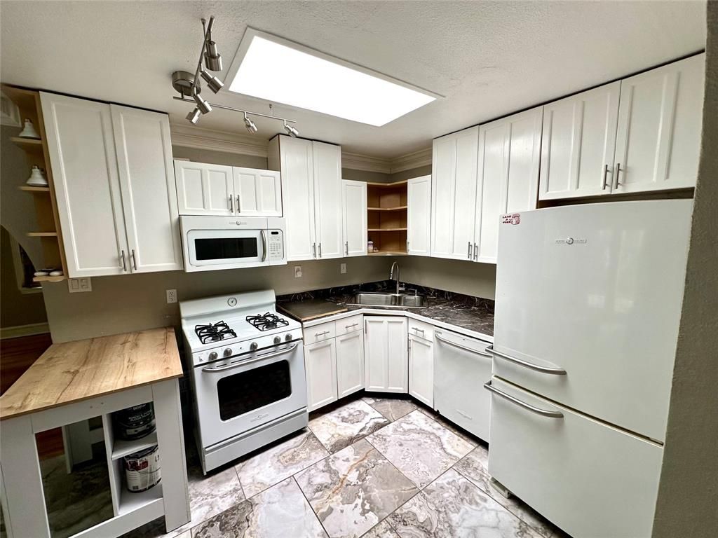 Photo of 8619 Groveland Drive, Dallas, TX 75218 (MLS # 21279754)