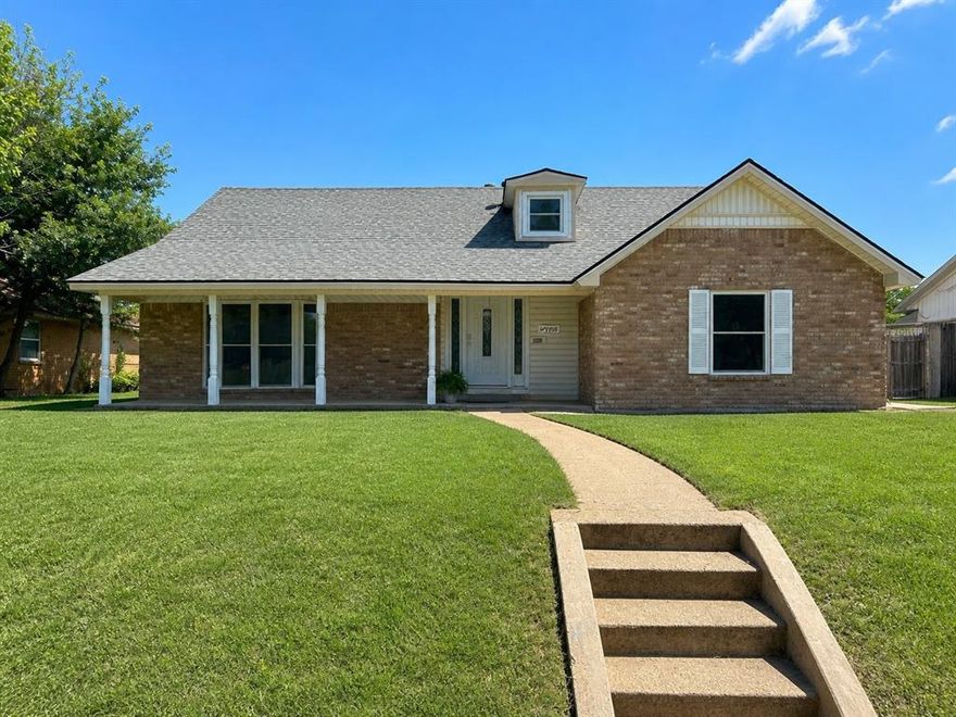 This charming traditional 2-story home in a well-established neighborhood features a spacious layout with 4 bedrooms and 3 full baths, plus a convenient half bath, making it perfect for any family. Brand new windows throughout! The open-concept design is ideal for entertaining, allowing for seamless flow between the welcoming den, which boasts a large brick fireplace and updated wood flooring, and the inviting kitchen complete with granite countertops. A standout feature is the second primary bedroom, which offers flexibility for multigenerational living or guest accommodation. This home has a large lovely backyard perfect for outdoor gatherings, and perfect for creating lasting memories.