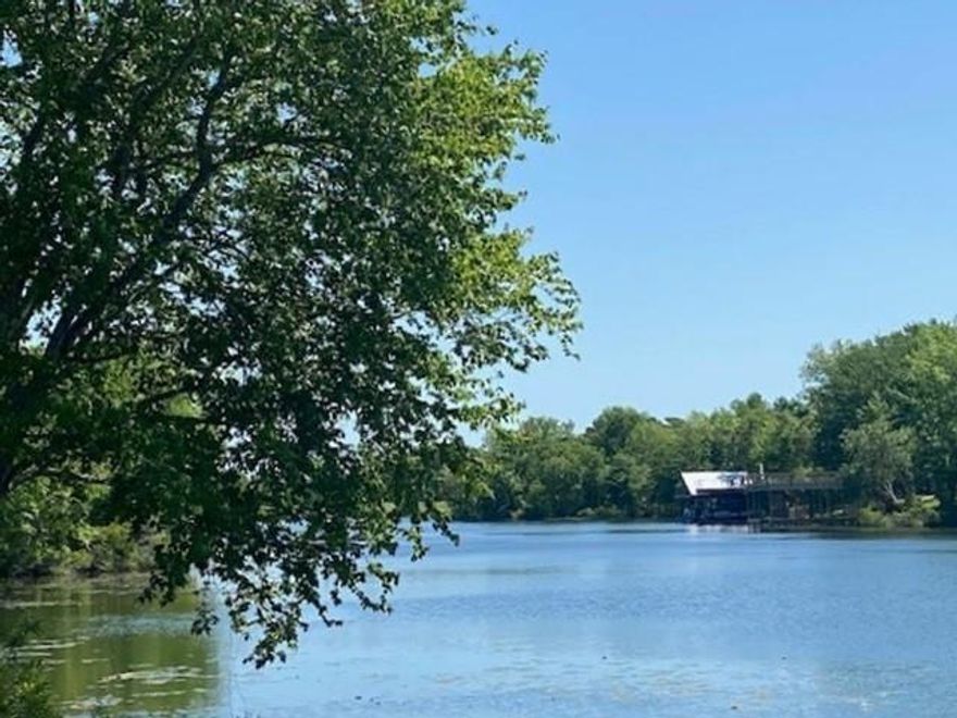 LAKE ATHENS WATERFRONT LOT! Excellent building lot on the pristine shores of Lake Athens with spotted hardwoods and approximately 86.07' frontage on Lake Athens! Adjoining lots are also available - See Broker for details!