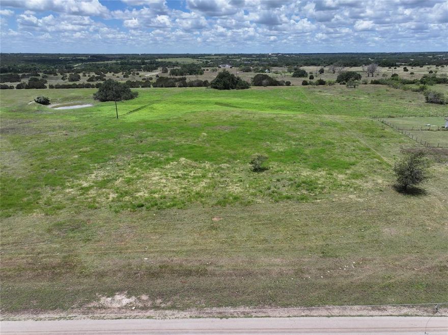 Beautiful lot waiting to fulfill your custom-built home! Located in a peaceful country setting along with a community of luxury homes. Gaze out at the scenic Texas landscape by day and the abundant stars at night. Bring your dreams and builder to design your special layout on this spacious 5 acre property. Watson Place offers a unique ag-exemption program allowing a community grass lease, for more information see their deed restrictions.