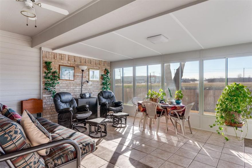 $10,000 TOWARD YOUR RATE BUYDOWN OR CLOSING COSTS! Ask your lender what a 2-1 buydown does to your monthly payment.
Former model home on a quiet cul-de-sac in Sutter's Mill, zoned to Keller ISD (Basswood Elementary, Vista Ridge Middle, Fossil Ridge High). 3 bed, 2 bath, 1,923 sqft, single-story brick on a 0.15-acre lot.

The flex feature here is a true sunroom. Floor-to-ceiling windows pull in natural light and add hundreds of square feet of bonus living space that doesn't show up in the heated total. Home office, playroom, reading nook, plant room. It reads whatever you need it to.

Inside, the main living room is anchored by bay windows and a wood-burning fireplace; the kitchen, dining, and family spaces connect in one easy line. Ceramic tile through the high-traffic areas, carpet in the bedrooms. The primary suite sits at the back and separated from the secondary bedrooms, includes updated bath with dual sinks, a lit three-setting makeup mirror, and a true walk-in closet.

Big-ticket updates are already handled: NEW energy-efficient windows throughout (lower utility bills, more even temperatures year-round), NEW wood privacy fence, full sprinkler system. 2-car attached garage. Voluntary HOA. Flood Zone X - outside the floodplain.

North Fort Worth location with quick access to I-35W and Basswood Blvd. DFW Airport ~25 minutes, downtown Fort Worth ~20, Alliance corridor minutes away. Move-in ready.