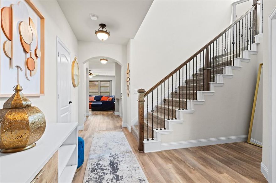 ASSUMABLE 3.75% INTEREST RATE. This stunning 4-bedroom, 2.5-bath home features three covered outdoor spaces perfect for relaxing — including a front porch, an upstairs balcony, and a large rear patio. Built by Bloomfield Homes, this is their coveted Dewberry plan, known for its spacious design, tall ceilings, and abundant natural light through oversized Low-E windows. Inside, you’ll appreciate the open floor plan with a chef’s kitchen equipped with granite countertops, extensive cabinetry, and one of the largest pantries Bloomfield offers. The kitchen is open to the large living room, making it ideal for entertaining. Upgrades include custom blinds, upgraded flooring, and a beautiful wooden garage door. The first floor features a formal office, laundry room, and a private owner’s suite. Upstairs, a spacious game room opens onto the front balcony and is accompanied by three large bedrooms. Outside, enjoy the classic brick-and-stone elevation, an impressive 8’ front door, coach lighting, and full landscaping. The community offers a playground and plenty of open green space, perfect for enjoying the outdoors. Plus, you’ll love the convenient, quick access to Highway 67 and I35W. This is a rare opportunity to take advantage of a 3.75% assumable loan while making this beautifully upgraded Dewberry plan your new home. Don’t wait to build — schedule your showing today!