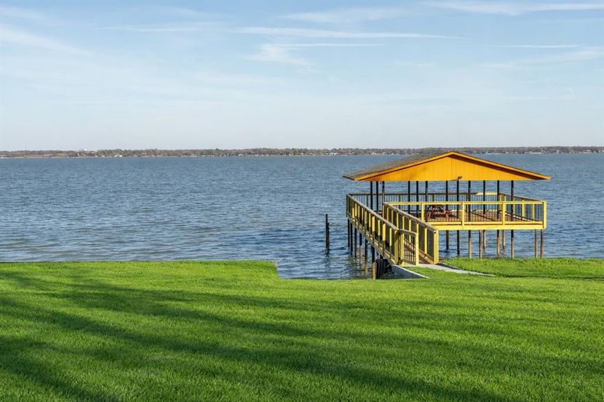 Welcome to the Lake House, a beautifully maintained 4-bedroom, 3-bath waterfront property located in Kemp, Texas. This exceptional lakefront home offers direct water access and a private deck, making it ideal as a primary residence, second home, or income-producing investment. The home features an open-concept layout with spacious living and dining areas, abundant natural light, and serene lake views. The modern kitchen is fully equipped with ample cabinetry and counter space, perfect for entertaining family and guests. With accommodations for large gatherings, multiple bedrooms, and well-appointed bathrooms, this property is designed for comfort and functionality. Outdoor living spaces provide the perfect setting to enjoy fishing, boating, sunsets, and peaceful lakefront living. Currently operated as a successful short-term rental, this property presents strong investment potential while remaining an ideal personal retreat.