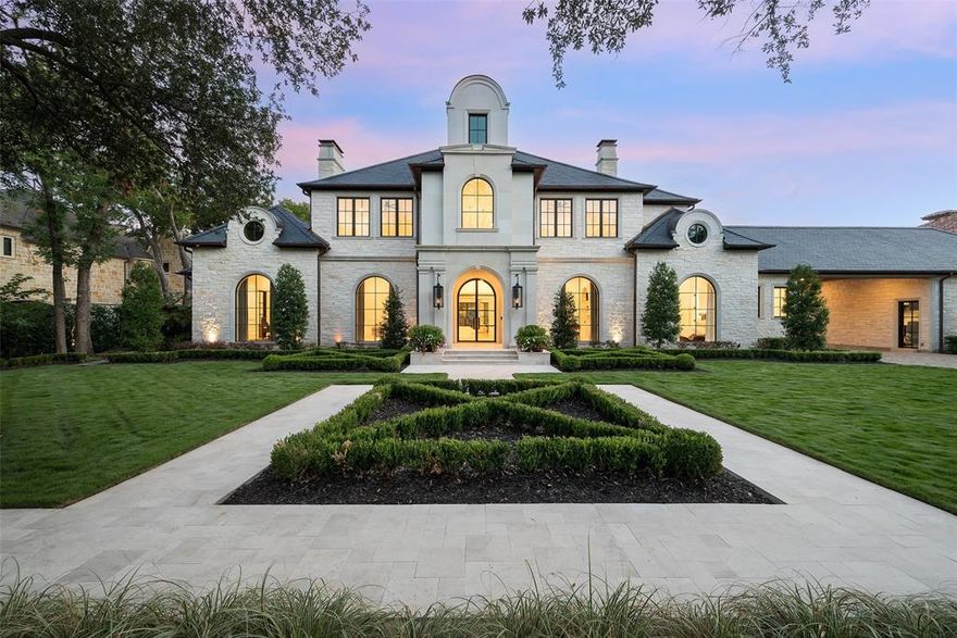 Stunning French transitional estate, designed by renowned architect Richard Drummond Davis and crafted by Colby Craig Homes, sits on 1.02 acres of serene landscape. Home features a gorgeous stone exterior all framed by manicured hedges and secured by an iron gate. Natural light pours into every corner. Upon entering the 25-foot foyer, you're greeted by a floating staircase, hand-carved marble fireplaces, and striking designer fixtures. The chef’s kitchen is a culinary dream, outfitted with Wolf-Sub appliances, a steam oven, a coffee unit, and dual dishwashers. The great room lead to a covered patio with an outdoor kitchen, remote-controlled shades, and a resort-style pool and spa, making this space ideal for hosting grand events. For intimate gatherings, relax in a dramatic speakeasy with a luxurious bar and a 2,000-bottle wine vault. Additional features include a library, office, game room, a 120 screen home theater, and proximity to shopping, dining, and prestigious private schools.