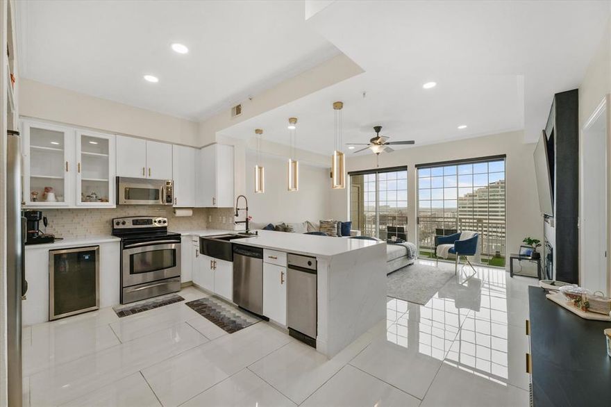 Immaculately renovated Penthouse Condo at the Renaissance West Tower with panoramic, unobstructed views. This stunning 1-bedroom residence exudes contemporary elegance and sophistication. The kitchen features a large sleek L-shaped quartz peninsula with a waterfall edge, complemented by a single bowl farmhouse sink, two pantry rooms, and modern white cabinetry. Enjoy modern convenience with control remote operated blackout shades, a smart light system, and a Nest Thermostat. The bathroom boasts a dual sink vanity and offers the convenience of two entrances - one connected to the bedroom for privacy and the other for shared access. Additionally, a spacious walk-in closet adds practicality and storage space. Residents of The Renaissance have access to 2 pools, 2 gyms, dry sauna, jacuzzi, 24-hour concierge and free valet service. Conveniently located walking distance to The Katy Trail, Uptown shopping & dining, and more. Refrigerator, washer, dryer and TV cable and water included.