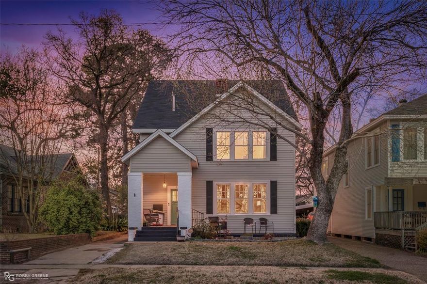 Welcome to this charming 3-story home in the heart of South Highlands! This 5-bedroom, 3.5 bath home is the perfect blend of historic soul and modern amenities. From the street, the property makes a statement with its manicured lawn and elevated position and once you step through the front door, it feels like home. The main living areas are flooded with natural light, highlighting the classic hardwood floors and high ceilings that define this neighborhood's charm. The layout is expansive and intuitive, offering plenty of space for a growing family or anyone who loves to host. The kitchen serves as the functional hub of the house, featuring ample cabinet space and granite countertops, while the formal dining and living rooms provide a more polished backdrop for gatherings. This home is unique with a hearth room, formal dining, a large second living area, a rear deck and an amazing sunroom off the master suite. Outside, the property continues to impress. The large back deck overlooks a deep, fenced-in backyard that feels like a private park, shaded by mature trees that are a staple of the South Highlands landscape. Whether you’re drinking coffee on the deck or watching the kids play in the yard, it’s a peaceful retreat right in the middle of town. This home sits on a quiet, tree-lined street just minutes from the best local dining, shopping, and parks Shreveport has to offer. It’s rare to find this much square footage and original detail in such a prime location. You'll have to sell all the beautiful charm in person to truly appreciate this property!