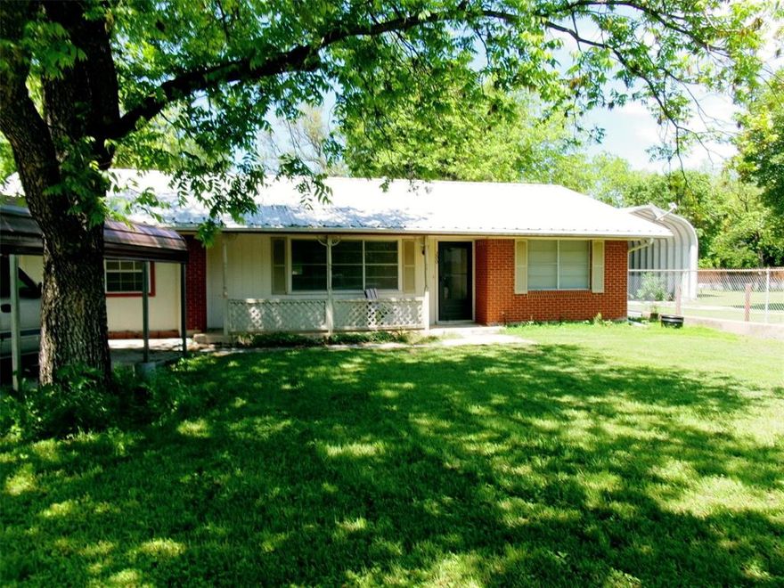 This charming ranch-style home offers the perfect blend of comfort and space. The open-concept layout seamlessly connects the kitchen, dining, and an extra-large living area, making it ideal for hosting or relaxing. 
Inside, you’ll find three large bedrooms and a spacious utility-laundry room. The home is thoughtfully finished with a mix of laminate, tile, and carpet flooring, with ceiling fans throughout to keep it comfortable. 
Recent upgrades and features include: a recently installed metal roof for long-lasting durability; gas central heat, water heater, and range; and electric central AC.
There’s also a covered carport for protected parking and a large backyard that is fully enclosed with a privacy fence, perfect for kids, pets, or weekend BBQs. 
This quaint gem is move-in ready and waiting for you.
Note: estimated taxes for 2026 with exemptions is $1,284.