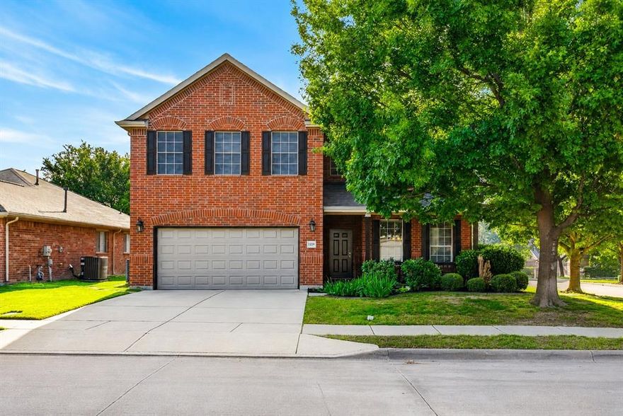 Exceptionally cared for home with all the space you need on a big corner lot in Fort Worth's Vista West neighborhood. Enjoy the convenience of being just minutes to I-30 and the 820 loop - close to shopping, dining, and entertainment. Quiet, established neighborhood boasts mature trees, sidewalk-lined streets, and a wonderful amenities center with a pool, playground, sports court, and a beautiful pond. Handsome curb appeal thanks to a shade tree, classic brick facade, lovingly-maintained landscaping and a great front porch. The interior shines with pride of ownership and improvements over the years: fresh interior paint, tile flooring, new oak treads and black iron rod spindles, crown molding, recessed lighting, granite countertops and hard flooring in the loft area upstairs. Formal rooms in the front of the home lead to an open concept living, breakfast and kitchen area - all spacious and washed with natural light and centered around a gas fireplace. The kitchen offers tremendous storage, prep space, and a gas stovetop. In addition to a large walk-in pantry are additional deep cabinets installed for even more storage. The guest bedroom downstairs is being utilized as a gym and connects to a well-appointed full bathroom. Upstairs is an open loft, a dedicated game room, three more secondary bedrooms, and a very generously sized primary suite. The large, grassy backyard is peaceful and private with a gorgeous perennial garden bed and a covered back porch big enough for proper relaxation and entertaining. Roof replaced 2024 with Class IV Hail Resistant product plus radiant barrier.