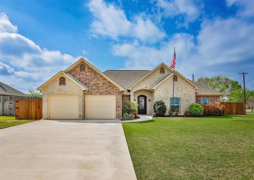 Welcome to this beautifully maintained home in the charming community of Collinsville. Designed with both comfort and functionality in mind, the open-concept floorplan creates an inviting space perfect for entertaining guests.  The kitchen is a true centerpiece, featuring custom cabinetry, stainless steel appliances, an extended island, and granite countertops that offer abundant prep and serving space. The spacious living area showcases vaulted ceilings with a wood beam and a stunning wall of windows, filling the home with natural light.  The generously sized primary suite provides a relaxing retreat, complete with an ensuite bathroom featuring a jetted tub, separate tiled shower, dual vanities, and an impressive walk-in closet. Guest bedrooms are thoughtfully split from the primary suite, offering privacy and ample space.  The double-door garage offers excellent functionality, with one bay measuring ~20 feet deep and the second extending to ~21 feet 9 inches. Situated on a desirable corner lot, the property boasts lush landscaping, a full sprinkler system, and newer fencing. A double gate on the west side allows for potential trailer or boat storage.  Additional highlights include a 12’ x 16’ storage building—perfect for tools, equipment, or hobby space. 2025 replacements:  Roof, Fencing, Gutters, Kitchen Range, Water Heater.    Buyer and buyer’s agent to verify all information provided by seller and seller’s agent.