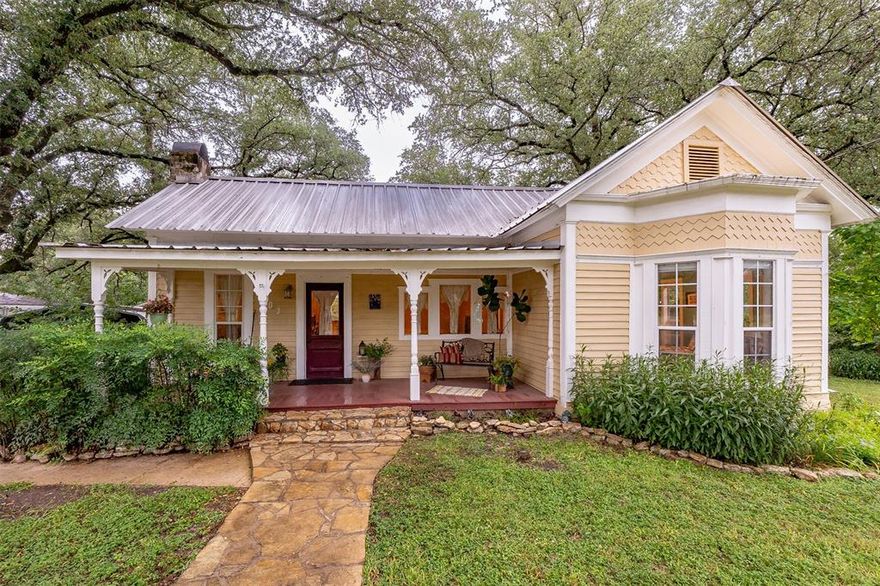 Step into timeless elegance with this beautifully maintained 3 bedroom, 3 bath home nestled under a canopy of mature oaks in the quiet central Texas town of Iredell.   This home blends historic charm with thoughtful modern updates, offering the perfect mix of comfort, character, and country living.  From the moment you arrive, you’re greeted by a welcoming front porch, ideal for rocking chairs and morning coffee. Inside, you'll find classic details like hardwood floors, high ceilings, and a cozy  fireplace.
Enjoy seamless indoor outdoor living with front and back porches as well as a wood deck off the side of the house strategically placed for shade, a gentle breeze and entertaining.  The property also includes a metal roof, detached structures, and plenty of fenced yard space ideal for gardening, pets, or even chickens!
Located in a peaceful setting with a country feel, yet just minutes from town conveniences, this home is truly one of a kind.
