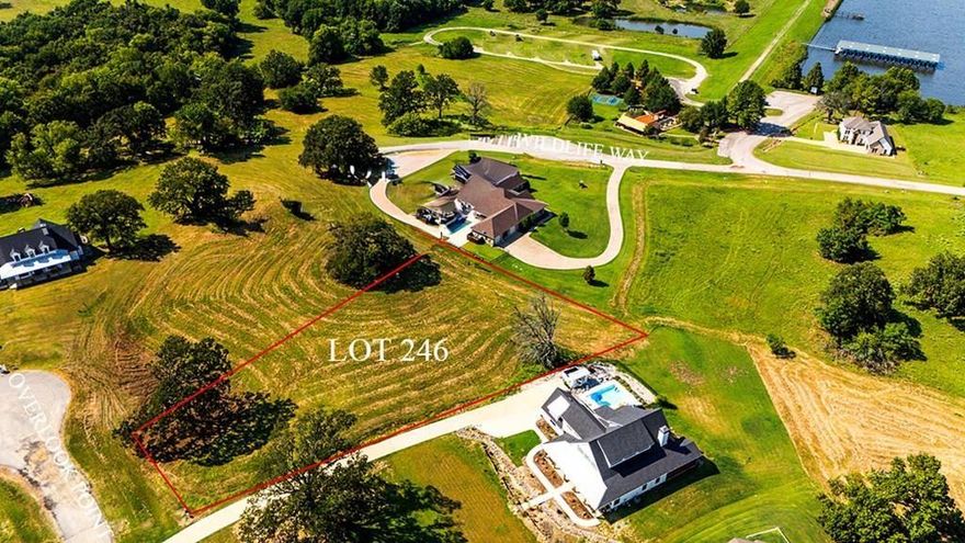 Discover the perfect opportunity to build your dream home on this 1-acre lot in Waters Edge Ranch, one of East Texas’ premier gated communities. This property offers views of the 328-acre private lake, setting the stage for a lifestyle of relaxation and recreation. Imagine waking up each morning to  tranquil surroundings, all while enjoying the security and privacy of a gated neighborhood. Waters Edge Ranch is known for its rolling hills, abundant wildlife, and first-class amenities, including a sparkling community pool, boat ramp & pickleball courts.  Whether you’re seeking a weekend getaway or a full-time residence, this lot provides the ideal canvas for your vision. Don’t miss the chance to invest in a property that blends natural beauty, convenience, and community. With utilities available and lake access nearby, this 1-acre lot is ready for your custom home. Call today to schedule your viewing!