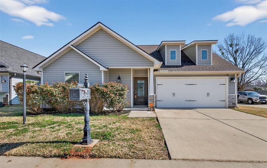 Welcome to this beautifully maintained 3 bedroom, 2 bath home with a 2 car garage, perfectly situated on a desirable corner lot in Golden Meadows Village. This home features a popular open floor plan with a spacious living and dining area, ideal for entertaining and everyday living. The large kitchen island is the heart of the home, offering ample counter space, storage, and seating. The kitchen comes fully equipped, all appliances remain, including the refrigerator, washer, and dryer. Making this home truly move-in ready. Enjoy a private remote primary suite with a spacious layout and en-suite bath for added comfort and privacy. Luxury vinyl plank flooring adds both style and durability throughout the main living areas. Step outside to a covered patio overlooking a private backyard. Located in Golden Meadows Village, this home offers convenience, comfort, and modern finishes all in one. Don’t miss your opportunity to own this immaculate corner lot gem!