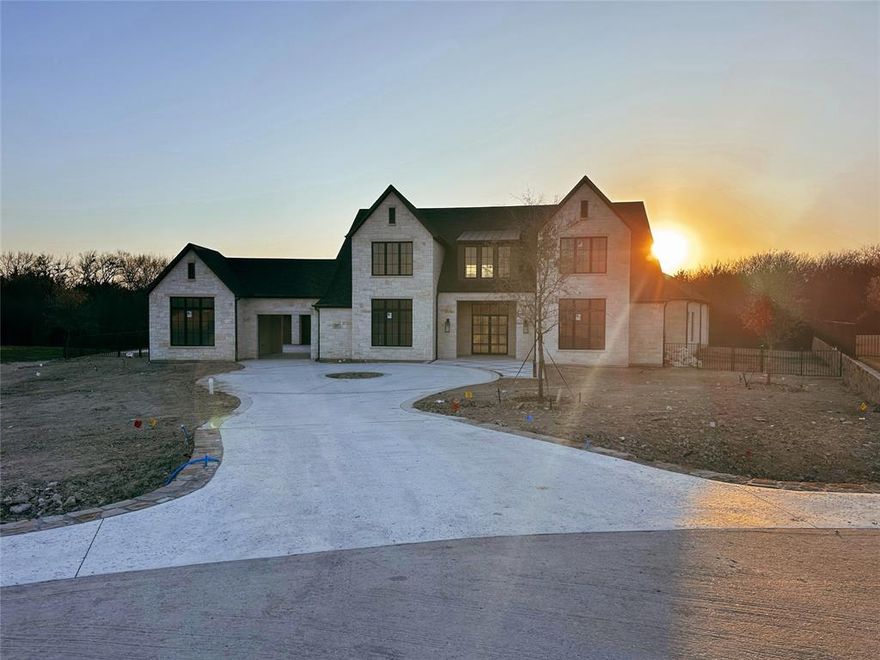 This exquisite Transitional English Farmhouse offers 6767 sq ft of luxurious living & convenience. The property is located in the beautiful community of Chamberlain Place in Fairview, five minutes from both highway 121 and 75. Situated on a cul-de-sac and wooded creek lot, this 5 BR, 5.2 bath is spectacularly upgraded throughout and built with precision. There are English Oak Hardwoods throughout. Entertainers will love multiple living areas, media room, game room, wet bar, peloton room, and many more amenities. The Porte-cochère is the entrance to a four car garage motor court. The chef's kitchen includes a Wolf range, double stove, Sub Zero fridge, wine fridge, leading to a large prep kitchen and pantry. Two fireplaces and a spacious outdoor kitchen and living area make this house perfect for hosting in the private backyard oasis with upgraded landscape. This home is under construction and will be complete in March 2024.