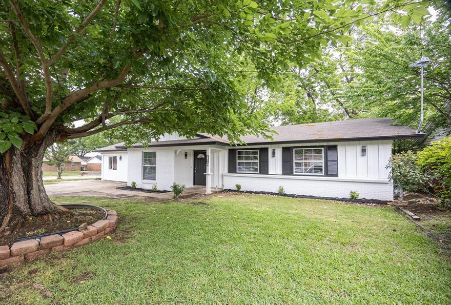 Welcome to this stunning, fully renovated 4-bedroom, 2-bathroom home offering modern finishes and comfortable living in a prime Arlington location. From the moment you arrive, you’ll be greeted by great curb appeal, mature trees, and a fresh, clean exterior design. Step inside to an inviting open concept layout featuring new flooring, recessed lighting, and a bright, airy living space perfect for entertaining. The kitchen is a true highlight, showcasing custom cabinetry, quartz countertops, a large island with seating, stylish pendant lighting, and stainless steel appliances.
Both bathrooms have been tastefully updated with modern fixtures and designer tile, including a spacious walk in shower in the primary bath. Each bedroom offers ample space, natural light, and a clean, contemporary feel. Enjoy outdoor living with a covered back patio ideal for gatherings and a generously sized backyard with plenty of room to relax or play. Conveniently located just minutes from AT&T Stadium, Globe Life Field, shopping, dining, and major highways, this home offers the perfect blend of style, comfort, and location.
Don’t miss this move in ready opportunity!