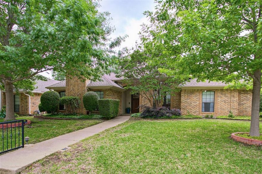 Well kept, gently lived-in one-story property in a quiet established beautiful neighborhood.  Beautifully landscaped with open floorplan.  Generously sized secondary bedrooms provide plenty of space for family, guests, or a home office.  Updated primary bath with added storage. Step outside to enjoy the covered patio—perfect for morning coffee or evening gatherings—overlooking a fully fenced yard with green space for play or gardening.  Location is everything, and this home delivers. Conveniently situated just minutes from historic downtown Grapevine with  easy access to charming boutiques, local wineries, dining, and year-round festivals. Nearby parks, walking trails, and Lake Grapevine provide endless opportunities for outdoor recreation. Nearby Southlake Town Square and Colleyville center are minutes away with much activity.  The property also offers quick access to major highways (121, 114, 360, 183, 26), DFW International Airport, and top-rated schools, making commuting simple. This home has been cared for and ready for a new owner in a highly sought-after community.   Own a well taken care of  property in the heart of Grapevine.