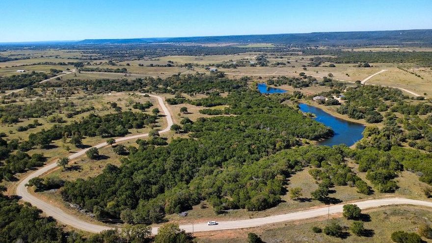 Welcome to 220 & 230 New Hope Rd in Palo Pinto Tx. Escape the city and embrace peaceful country living on 10.338 acres in the private gated Community of River Bend Ranch. Featuring 360-degree views of the beautiful Palo Pinto Mountains, the property has mature oak and cedar trees, private pond for fishing, offering exceptional privacy, natural beauty and abundant wildlife. Ideal for outdoor enthusiasts. Enjoy the benefits of an ag exemption and exclusive access to the Brazos River via a Community area, perfect for hiking, fishing and recreation. Paved roads and electricity available, this property is ready for your dream home or weekend retreat. Property Owners are only allowed to fence in 1 acre to ensure the ag exemption. Minutes from Palo Pinto Lake, 20 Miles from Mineral Wells, 38 Miles from Weatherford.
