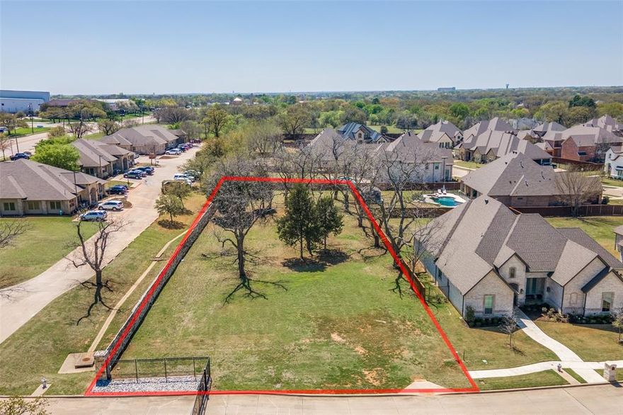Build your custom dream home on this expansive 0.6-acre corner lot—one of the largest in the subdivision—within a prestigious gated community in Arlington. Zoned for the highly sought-after Mansfield ISD, this prime location offers top-tier education and an exceptional lifestyle. Enjoy a 13-acre park, scenic walking trails, and a peaceful picnic area, all within your neighborhood. This is one of the last remaining lots in the community. A thoughtfully designed floor plan is already in place, but you still have the flexibility to customize it to your needs. Don’t miss this rare opportunity—secure your future home today before it’s gone!