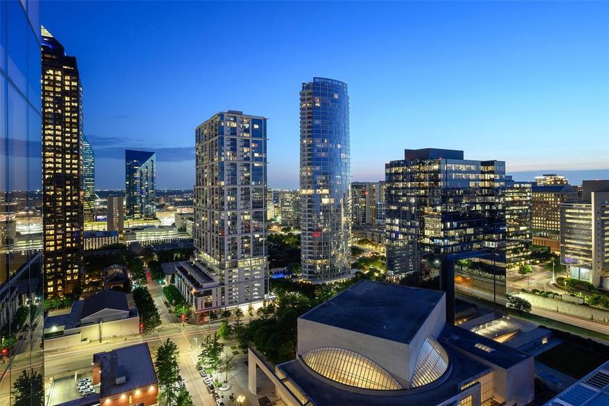 Thoughtfully reimagined condo at prestigious HALL Arts Residences. Superior craftsmanship and custom features, create a gem in the heart of the vibrant Dallas Arts District. Floor to ceiling windows offer natural light throughout. Enter the home to an artful lounge fitted with a bar including two integrated refrigerator drawers providing the ultimate convenience for entertaining, hardwoods and TV console. The Great room with 270-degree skyline views: Built-in dividing wall with wine storage. Kitchen boasts bulthaup cabinets with drawer system and Gaggenau appliance package. Butler’s pantry: SieMatic cabinets, coffee station, designer backsplash, second dishwasher and sink. Sanctuary of a primary suite with hardwoods, his and hers California Closets. Refined powder room. Guest bedrooms: custom closets. Utility room: organization system. Features: Venetian plaster, bespoke wallpapers, custom drapery, Control 4 system, designer light fixtures, Lutron lighting, Sonos AV system, power at the parking spots. A statement of luxury. Amenities: wine storage, treatment room, dining room, catering kitchen, pet spa, fitness room, lap pool, spa, putting green, outdoor grill. Services: 24 7 concierge valet, house car, community events. HALL Arts Hotel partnership. 3 Parking. 1 Storage.