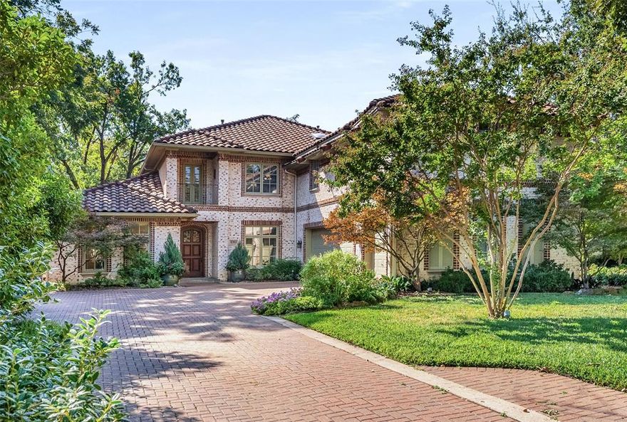 6302 Waggoner Drive is a custom-built home from 2001 nestled in the prestigious Preston Hollow neighborhood. This sophisticated residence boasts a thoughtfully designed floorplan, featuring a luxurious primary suite on the main level and two spacious bedrooms upstairs, along with a versatile fourth bedroom that can serve as an in-law suite or media playroom with its ensuite bath and kitchenette.

The heart of the home is the open-concept living area, where beamed ceilings and a cozy fireplace create an inviting ambiance. Flooded with natural light, the space flows seamlessly into a gourmet kitchen—a chef’s dream equipped with top-of-the-line appliances, an expansive island, and a walk-in pantry.

Enjoy effortless indoor-outdoor living with a beautifully landscaped, turfed backyard and a charming screened porch complete with a ceiling fan—ideal for entertaining or relaxing. Below the main living spaces, you’ll find a fully finished basement with a small living area and full bath—perfect for a workout room, media retreat, or whatever suits your lifestyle. Additional highlights include an upstairs living area with custom built-ins and a whole-house generator to keep everything running smoothly during any power loss.

This home’s unique layout, along with an elevator, offers flexibility and functionality to suit any lifestyle, making it the perfect blend of style and comfort.

Situated in a vibrant community, 6302 Waggoner Drive offers convenient access to all the best that Dallas has to offer. Experience luxury living at its finest in this remarkable home.