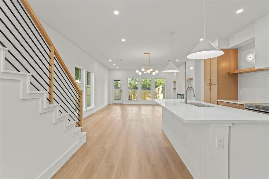 Modern Newly Built Half Duplex at 1322 Fletcher Street!! Discover contemporary living at its finest in this beautifully designed half duplex featuring three spacious bedrooms, three full bathrooms, and a convenient half bath. Step inside to a bright and open layout enhanced by luxury vinyl plank flooring throughout. The living room features an elegant electric fireplace and modern sconce lighting that create a warm and inviting atmosphere.
The gourmet kitchen is a true highlight with a large center island, electric appliances, custom cabinetry, open shelving, and a sleek tile backsplash. 
Upstairs, all three bedrooms offer access to a full bath. The primary suite stands out with a custom feature wall, a private ensuite bathroom, and a spacious walk-in closet. Outside, enjoy a private backyard that provides the perfect space for pets, play, or relaxation.

Located within walking distance of the State Fair, this modern home combines style, comfort, and convenience in a desirable location. Schedule your private tour today.