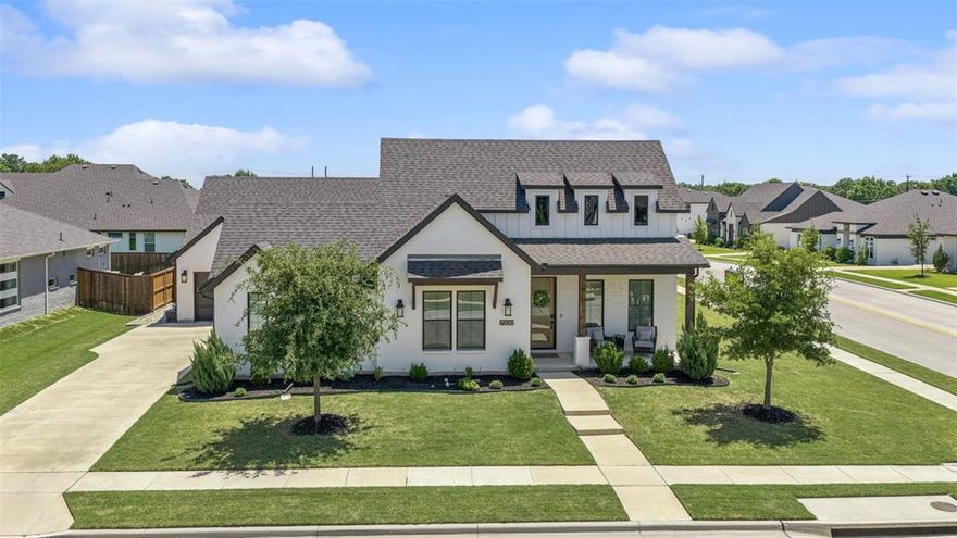 Situated on a desirable corner lot within a quiet cul-de-sac in Eden Estates, 7200 Chance Ct in North Richland Hills showcases exceptional modern design, curb appeal, and thoughtfully curated finishes throughout its 3,037 square feet. This 3-bedroom, 2.1-bath home welcomes you with beautiful wood flooring, decorative lighting, and an open, functional layout ideal for both everyday living and entertaining. Just off the entry, a private office provides the perfect work-from-home space, while a formal dining room connects seamlessly to a stunning kitchen featuring an oversized island with breakfast bar, beautiful quartz counters, butler’s pantry, large walk-in pantry, gas cooktop, and stainless steel appliances. The kitchen opens to a bright breakfast area and spacious living room anchored by a sleek fireplace and filled with natural light. The primary suite offers a true retreat with a large walk-in closet and a luxurious ensuite bath complete with dual vanities, a freestanding soaking tub, and an oversized glass-enclosed shower. Two secondary bedrooms share a well-appointed bath, and a convenient half bath is ideal for guests. A large gameroom adds flexible living space for media, play, or relaxation.

Outdoors, enjoy a covered back patio overlooking a sparkling pool and a grassed yard—perfect for entertaining or unwinding. The property also features a rare three-car garage configuration, including a two-car garage plus a separate single-car garage. Located in the sought-after Eden Estates community, this home offers convenient access to major highways, shopping, dining, and entertainment, with nearby parks, trails, and recreation options adding to the appeal. Combining modern style, spacious design, and a prime North Richland Hills location, this home delivers both comfort and lifestyle.