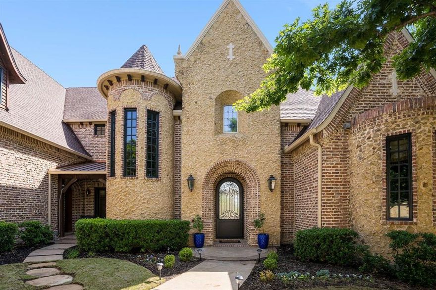 New flooring and lighting. Ready for move in! Luxury awaits you in this exquisite New Haven custom home overlooking the 17th green of the award winning Lantana golf course. You'll find a perfect balance of classic design and modern livability with floor to ceiling windows, a one of a kind stained glass dome, and a fully screened wrap around main floor patio. 4 fireplaces add elegance as does the richly appointed home office with hidden room behind the bookcase for your valuables. Everyone will enjoy privacy with each bedroom containing an ensuite bath as well as 2 half baths for guests. The chef's kitchen has a Thermador 6 burner gas range, double ovens, and 2 dishwashers. Wine aficionados will love the wine cellar as well as multiple wet and dry bars throughout the home. 3 wrap around covered porches offer unparalleled panoramic views overlooking the spa, infinity edge pool, 5 waterfalls, fire pit, outdoor kitchen, and golf course. With 2 primary suites and 5 living areas including space for a home gym, study, media room, 2 gamerooms, and over 900 sqft of flexspace, this home is ideal for multigenerational living as well as corporate entertaining. The 4 car garage is fully heated and cooled and comes equipped with a Tesla EV charger. The quality of construction is unparalleled. This exquisite home was built for those with discerning taste and an eye for detail.