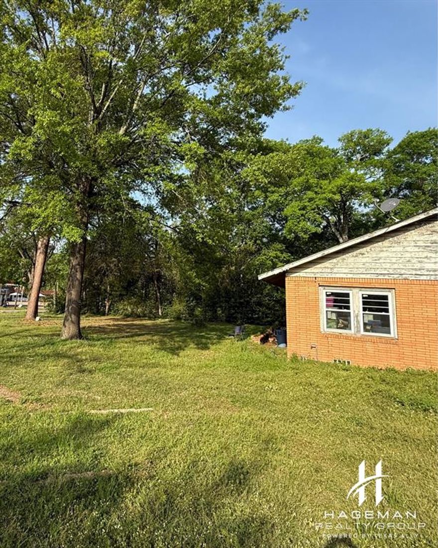 Discover a remarkable opportunity in the heart of Pittsburg, where potential meets charm on a sprawling 4.28-acre property. This three-bedroom, two-bath home presents an exciting blank canvas for your dream renovation project, having been stripped to the studs and ready for your personal vision to take shape.

A gracefully winding driveway welcomes you to this spacious estate, where the possibilities are as endless as the views. The generous acreage behind the home offers the perfect setting for an expansive garden, nature exploration, or whatever outdoor pursuits capture your imagination.

The property's location is nothing short of ideal, situated adjacent to the Pittsburg Library and within easy reach of the historic downtown area. Education and recreation are equally accessible, with Pittsburg High School and Julius Moore Park both just moments away, making this location perfect for families seeking the perfect balance of rural tranquility and community convenience.

The home's layout features three well-proportioned bedrooms, including a comfortable primary bedroom, and two full bathrooms. While currently awaiting renovation, the structure provides an excellent foundation for creating a truly custom living space tailored to your preferences.

This property represents a unique opportunity to combine the charm of small-town living with the space and freedom of country life, all while being close to essential amenities. Whether you're an aspiring gardener, nature enthusiast, or simply seeking room to grow, this property offers the canvas for your next chapter.

TAXES:  SOURCE COUNTY APPRAISAL DISTRICT