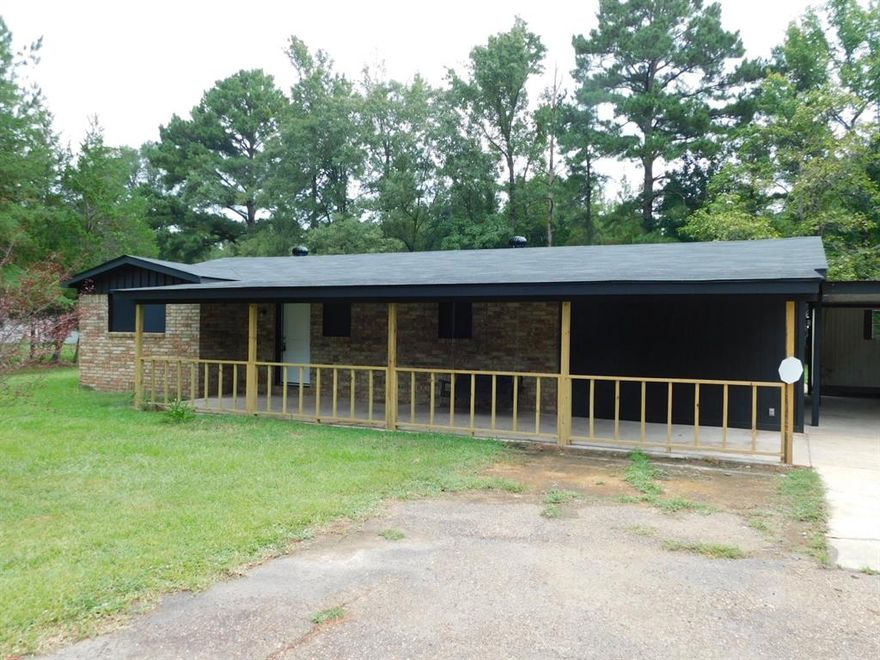 $10,000 PRICE REDUCTION. COMPLETELY REMODELED 2 BEDROOM 1 BATHROOM HOME IN THE COUNTRY! ALL NEW SHEETROCK, ALL NEW PLUMBING, ALL NEW ELECTRIC WIRING, NEW COMPOSITION ROOF, NEW WINDOW SOLAR SCREENS, ALL NEW KITCHEN CABINETS & FIXTURES WITH NEW ELECTRIC RANGE, DISHWASHER AND REFRIGERATOR. ALL NEW BATHROOM FIXTURES INCLUDING TUB, SHOWER, TOILET AND VANITY. HOME FEATURES LIVING ROOM AND COZY DEN WITH RUSTIC LOOKING TIN CEILING. UTILITY ROOM HAS RECENT WATER HEATER AND WASHER & DRYER. HOME ALSO HAS NEW VINYL FLOORS, FRESH PAINT, 6 PANEL COLONIAL DOORS & CEILING FAN-LIGHT FIXTURES. HOME ALSO FEATURES NEW STEEL EXTERIOR ENTRY DOORS, HUGE 10 x 37 FOOT COVERED FRONT PORCH (WITH PORCH SWING). ATTACHED DOUBLE CARPORT IS 24 x 25 FEET WITH A 12 x 24 FOOT STORAGE BUILDING COMPLETE WITH ELECTRICITY, AIR CONDITIONER, CEILING FAN, BUILT IN WORK BENCH AND STORAGE SHELVES. 1000 GALLON SEPTIC TANK IS ALSO NEW. THIS HOME IS NEAT AS A PIN! JUST BRING YOUR CLOTHES! $107,000.