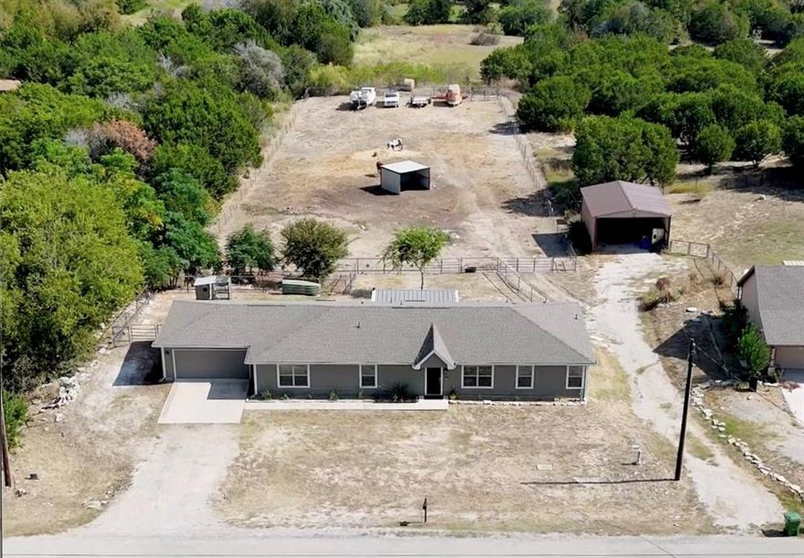 Spacious 4-Bedroom Home on 1.3 Acres – Horses Allowed!
Enjoy peaceful country living with modern comforts in this beautiful 4-bedroom, 2-bath home featuring a fantastic open floor plan and generous room sizes throughout! Every room is spacious, offering a comfortable layout that’s perfect for everyday living and entertaining. The kitchen boasts granite countertops, an island, built-in microwave, and plenty of cabinet space. The primary suite includes a large walk-in closet, dual sinks, and a walk-in shower. You’ll also love the functional laundry room with built-in shelving, cabinetry, and a folding area. A large bonus room offers endless possibilities—use it as a game room, gym, media room, or extra living space. Step outside to enjoy stunning sunrise views from the back patio. The property is fully fenced for horses and includes a loafing shed and chicken coop. With 1.3 acres of space and country charm, this home perfectly blends comfort, versatility, and rural living!