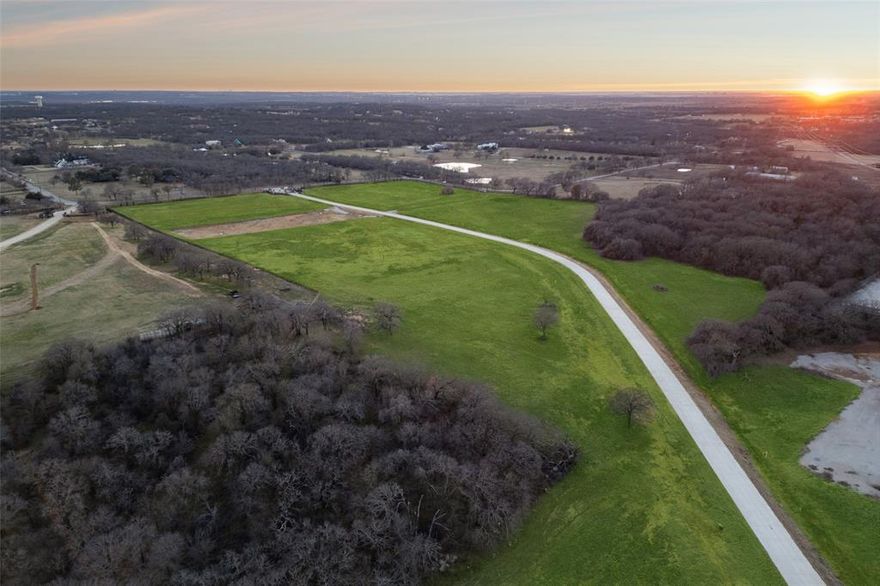 Knights Landing is Bartonville’s first and only privately gated ranch estate community, a rare and limited-release enclave offering just 15 exclusive six-acre Ag-exempt homesites starting at $1.35M. Fully improved with utilities and ready to build, this private estate community is located in Bartonville and served by Argyle ISD, a district widely recognized for its top academics and championship athletics. Designed for those who value land, privacy, and permanence, Knights Landing represents a level of estate living unmatched anywhere in North Texas. Each expansive six-acre homesite provides the freedom to create a true generational estate, whether that vision includes equestrian facilities, guest residences, car barns, sports courts, orchards, gardens, or resort-style outdoor living. Every property carries Ag-exempt status, allowing owners to benefit from dramatically reduced annual taxes, making this offering not only a lifestyle upgrade but also a strategic long-term land investment. As the first gated residential community ever approved in Bartonville, Knights Landing features a secured private entrance, architectural standards, and perimeter privacy designed to preserve both the identity and long-term value of the community. Select homesites also feature a protected open utility corridor behind the property, creating a permanent open-space buffer that enhances privacy and protects unobstructed views. Knights Landing is not a typical subdivision but a curated opportunity for generational living, where each six-acre parcel becomes a canvas for architecture with presence, purpose, and permanence. What you are truly acquiring is more than acreage, it is a rare piece of Bartonville land, a tax-efficient hard asset, a protected gated estate address, and the foundation to design a legacy property meant to endure for generations.