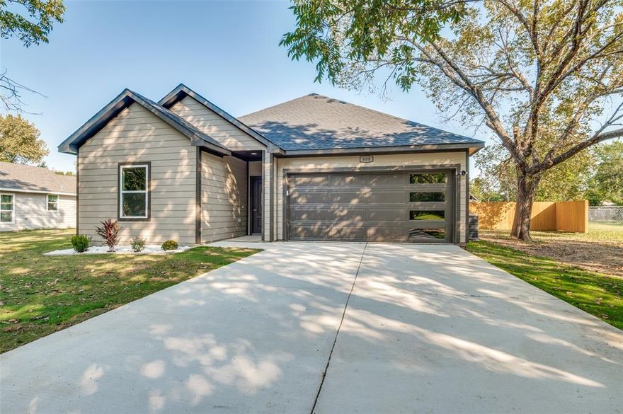 Seller is offering $$ in sellers concessions with an acceptable offer! Come fall in love with this stunning new construction home featuring three bedrooms, two full bathrooms, & 2CG . As you walk in, you will love the open-concept living & dining area, where natural light floods the space, highlighting the beautiful floors & modern finishes throughout. The living-dining space invites you to unwind in comfort, while the Modern kitchen, equipped with new appliances, plenty of cabinetry, quartz countertops, and a spacious island, is ideal for entertaining guests. Primary suite includes a spacious bathroom with beautiful tile flooring, dual vanities, and a luxurious walk-in shower. Full Size Laundry room. Spacious backyard with covered deck! Schedule your private showing today! Ask about financing options: 100% Financing, No MI, No Origination-Lender Fees, Competitive interest rate, 580 credit score