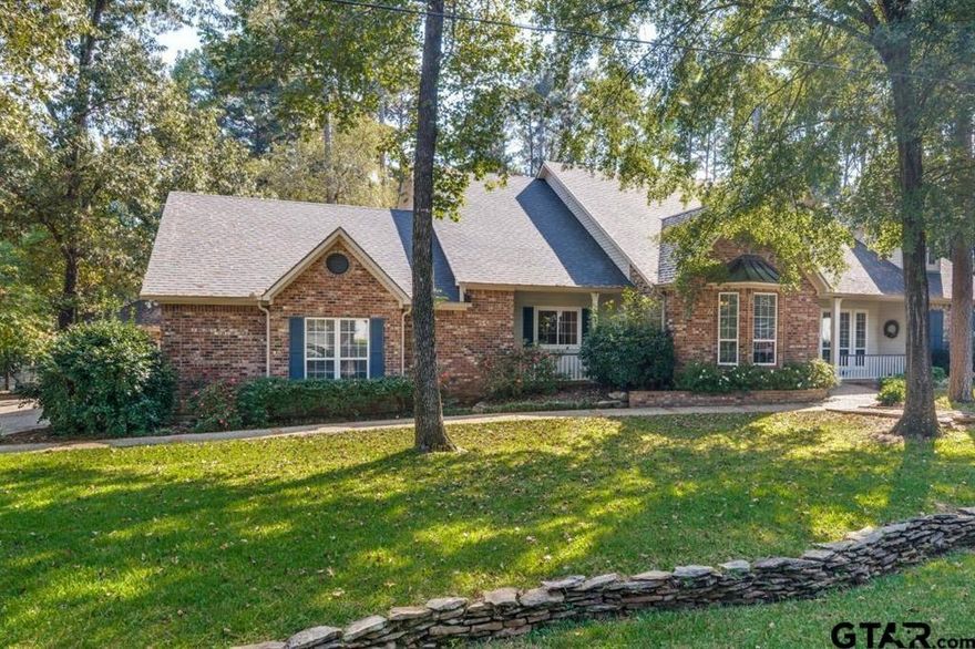 Beautiful oversized 3-lot property in Hideaway Lake with towering pines, lush landscaping, a nearly new pool and hot tub, dry creek, fire pit, 3-car garage, and detached workshop. This 3,500 sq ft home features a large family room with gas fireplace, wraparound screened patio, and an open kitchen with granite counters, island, breakfast bar, and updated appliances. Main level includes dining room, breakfast area, game room, second living, office with built-ins, two baths, large utility room, and a spacious primary suite with jetted tub, walk-in shower, and huge closet. Upstairs offers three bedrooms with walk-in closets, a Jack-and-Jill bath, and walk-out attic spaces with room to expand. Backyard retreat INCLUDES INGROUND POOL with waterfalls, custom decking, iron fencing, and wood bridge leading to the fire pit.  SEE LISTING DETAILS FOR COMPLETE LIST OF ALL AMENITIES