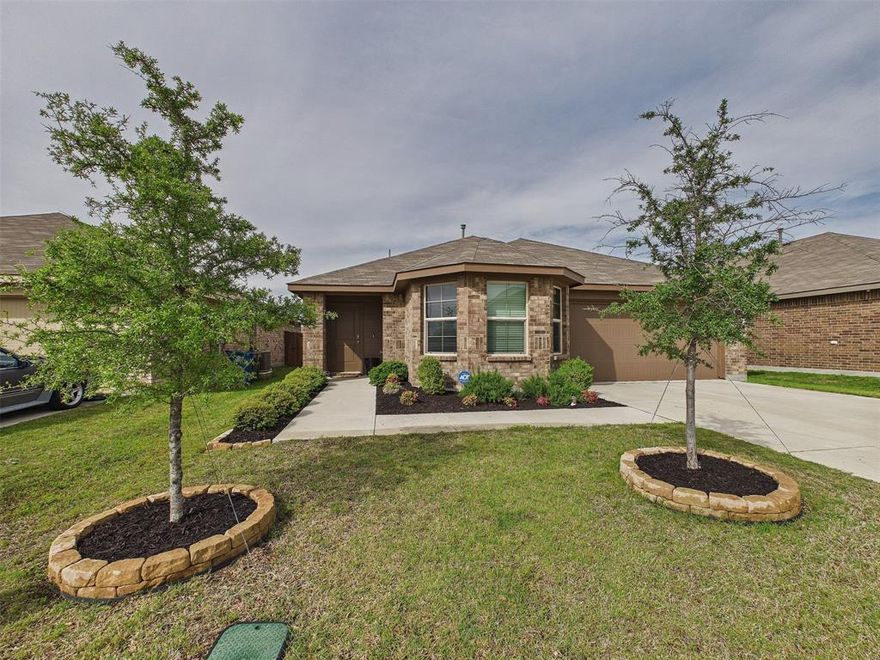 Set on a welcoming street in Justin, this home offers a functional and comfortable layout, perfect for everyday living. Step inside to an open concept living area where the kitchen seamlessly connects to the dining and living spaces, creating an ideal environment for entertaining or simply staying connected. The kitchen features ample cabinet storage and a generous island, ready for meal preparation.

The primary suite provides a private retreat, complete with an en-suite bathroom and walk-in closet, offering a peaceful space to unwind. Two additional bedrooms offer flexibility for family, guests, or a home office. A dedicated laundry room adds convenience to the home's practical design.

Outside, the backyard offers space for outdoor enjoyment. Located in Justin, this home provides convenient access to local amenities and is situated within a pleasant community. Schedule your private showing to explore the potential of this well-arranged home.