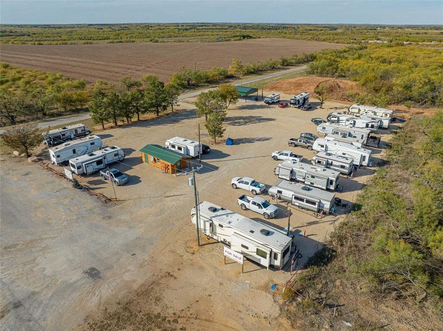 Investors take note! There a lot of momentum happening in Stephens County, Texas, and the surrounding area — making this RV park opportunity even more timely.  Nestled just 7 miles outside Breckenridge, Texas, TX, at the corner of Hwy 180 W and County Road 336, this beautifully maintained 18-site RV park offers the serene setting today’s RV community values — quiet, clean, and conveniently located. The property features public water hookups, an on-site septic system, and one mile down the road, you’ll find a boat ramp with easy access to Hubbard Creek Reservoir. On the 1.5 developed acres, you’ll find 18 fully prepared sites, a restroom with a shower, a laundry room, and a pavilion perfect for gatherings. An additional 31 acres are available for purchase if you’re considering expansion. This is a rare opportunity to own an RV park that blends peaceful, lake-adjacent living with easy highway access and a market-ready setup.
