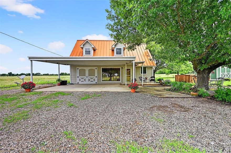 Nestled on 10 peaceful acres, this gated property offers the perfect blend of privacy, charm, and functionality. Surrounded by mature trees and serene natural beauty, this inviting home welcomes you with a warm, open floorplan designed for both everyday living and entertaining. Featuring stainless steel appliances, Quartz countertops, an abundance of cabinet space. The living area flows seamlessly, creating an airy and connected space for relaxing or hosting guests. The generously sized master suite is a true retreat, complete with dual sinks and ample room to unwind. The thoughtfully designed laundry room includes built-in storage and a convenient sink, adding to the home’s everyday ease. Covered parking adds protection and convenience, while the expansive acreage invites you to enjoy the outdoors, whether you're gardening, exploring, or simply soaking in the quiet, country lifestyle. RV Parking with 30 AMP outlet