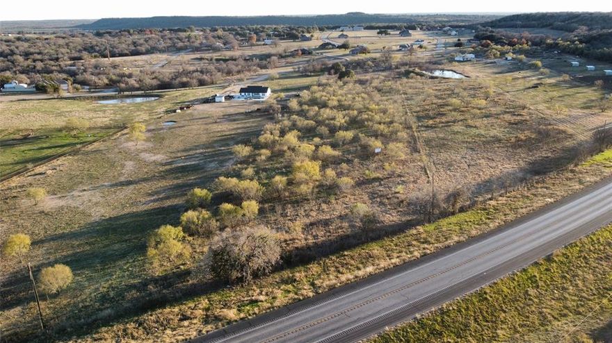 This beautiful 4.5-acre property stretches all the way from Brazos West Drive to Highway 180, offering the perfect spot to build your dream home. Nestled in a quiet, well-kept subdivision with quality homes, you’ll enjoy the peace and privacy of country living while still being just minutes from town and all its amenities.

The land is ready to go with electricity available at the road. There’s plenty of space for your custom home, a shop, animals, or whatever you’ve been dreaming about.

If you’re looking for a great mix of space, convenience, and a solid neighborhood, this one’s hard to beat.

Also available is 170 BRazos West Dr (2 additional acres) that contains a water tap. See MLS #20950526