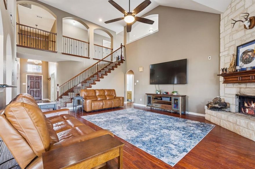 Welcome to 5636 Wills Creek, Fort Worth, TX 76179, a 3,654 square foot two-story home built in 2009 in Marine Creek Ranch. This five-bedroom, three-and-a-half-bath property features an open-concept floor plan, dedicated home office, game room, media room, and oversized backyard—ideal for buyers seeking flexible living space, remote work options, and multi-generational layout design. The main floor offers a spacious living room filled with natural light that flows into the formal dining area and large eat-in kitchen. The kitchen provides extensive cabinetry, generous counter space, and backyard views for everyday function and entertaining. A private study creates a true work-from-home office or flex room. The primary suite is thoughtfully separated from secondary bedrooms and includes a large ensuite bath and walk-in closet with custom built-in drawers for enhanced storage. Upstairs, a wide landing serves as an additional living area or homework station. The second level also includes a dedicated game room and enclosed media room for movie nights or recreation. The updated upstairs bathroom features newly installed shower tile for a modern finish. Additional improvements include a custom half-bath vanity and built-in laundry cabinetry. Recent exterior updates include fresh paint, trim improvements, and landscaped flower beds that enhance curb appeal. The expansive backyard offers room for a pool, outdoor kitchen, covered patio extension, or personalized outdoor living space. Located near Marine Creek Lake, parks, trails, shopping, dining, and major highways including Loop 820 and Highway 287, this Fort Worth home provides commuter convenience and neighborhood appeal. Zoned to Eagle Mountain-Saginaw ISD. Bundled service pricing available. Contact the listing agent for details and private showing information.