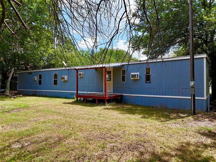 SELLER IS MOTIVATED!! Welcome to this 3-bedroom, 2-bath single-wide home sitting on over a third of an acre. The open-concept floor plan provides a seamless flow between the living room, dining area, and kitchen, making it both functional and inviting. Conveniently located just off Azle Highway, this home offers easy access to Fort Worth, Weatherford and Azle.

The property next door is also available for sale (2014 Spring Ct, Azle, TX 76020) presenting a rare opportunity to own two side-by-side homes. Combined, the lots offer plenty of space for a family compound, multigenerational living, or an investment setup, live in one and rent the other, or rent both for steady income.