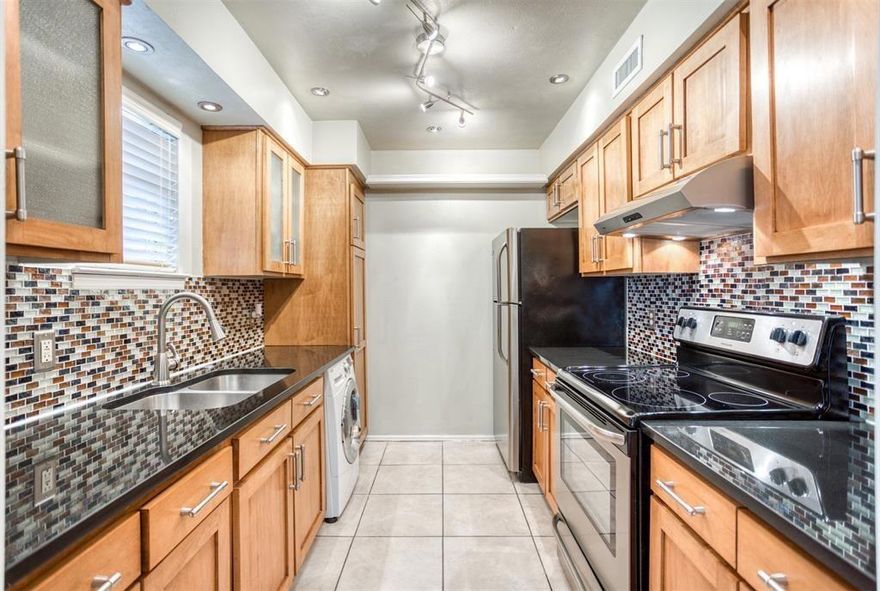 UPDATED Bright and Light just the right size!! (2BR 1BA) ALL UTILITIES INCLUDED in HOA too.
Primary Bedroom with Envious Custom Walk-in Closet. Secondary bedroom with beautiful built in Closet -- this space could also work great as your home office.  Enjoy some Peace and quiet overlooking from your Private Balcony.  Brand new carpet and Paint.
Updated kitchen with dual Washer Dryer conveniently in your Home (there is another full size Laundry option on the property too) 

Ideal for NorthPark, SMU, Downtown, local colleges, parks, schools, and simple 75-635-Tollway commuting.