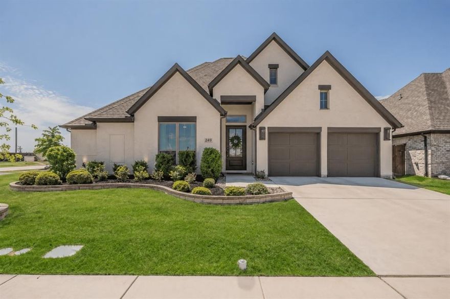 Welcome to this stunning, highly upgraded home featuring over $100K in builder upgrades, a thoughtfully designed open-concept layout, and a desirable split-bedroom floor plan.

At the heart of the home, the chef’s kitchen impresses with quartz countertops, an oversized island, a commercial-style 6-burner gas range, a custom hood, full-height designer backsplash, and statement lighting — all perfectly positioned for both everyday living and entertaining.

The expansive living space is designed to impress, featuring a dramatic floor-to-ceiling stone fireplace, a beautifully crafted wine cabinet with dedicated counter space, and a premium surround sound system with integrated music for the ultimate entertainment experience. A wall of windows fills the home with natural light and seamlessly connects indoor and outdoor living.

Step outside to your extended covered patio, where elevated views and no direct rear neighbors create a private and relaxing outdoor retreat.

The secluded primary suite offers a peaceful escape, complete with abundant natural light and a spa-inspired bathroom featuring dual vanities, a soaking tub, and an oversized walk-in shower.

A versatile flex space behind elegant French doors provides endless possibilities — perfect as a media room, game room, or home office to suit your lifestyle.
A large 3-car garage provides ample storage and parking, complete with a built-in Tesla charger for modern, energy-efficient living.
Located in the highly sought-after Ventana community, residents enjoy resort-style amenities including pools, scenic trails, parks, and convenient access to shopping, dining, and outdoor recreation.