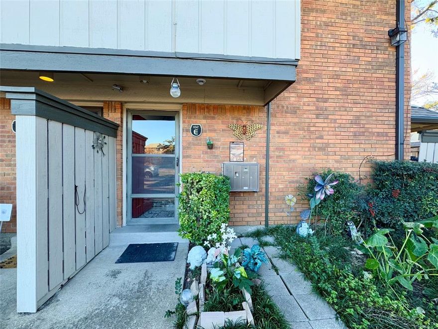 WELCOME HOME! This open concept 2 bed 1.5 bath condo has so much to offer with many thoughtful upgrades! Some of them include ceramic tile flooring throughout living areas, stone accent wall, complete kitchen remodel, installation of washer dryer connection, modern light fixtures, updated shower, recessed lighting and much more! The condo is located next to the community pool and laundry facility. Covered parking is included. Don't miss out on this great property!