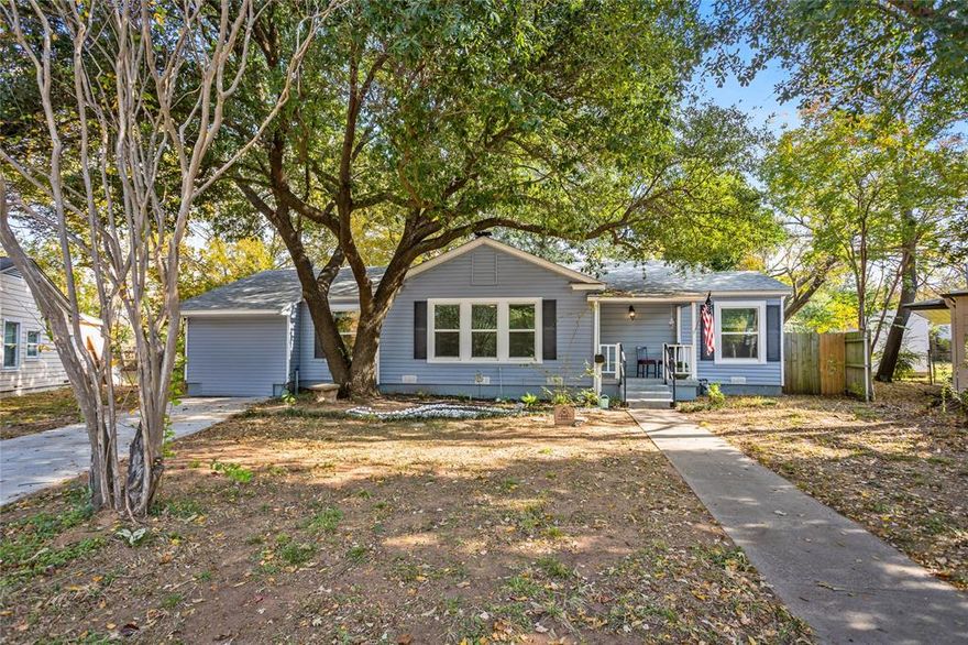 Charming 1948 vintage home beautifully updated with modern, on-trend designer finishes throughout. This inviting property features rich original wood flooring that flows seamlessly from the front entry into the spacious living and dining areas. The updated kitchen includes recent cabinets, contemporary fixtures, and modern appliances—perfect for everyday living or entertaining. Energy efficiency shines with high-performance windows and upgraded attic insulation, keeping the home comfortable year-round. Enjoy a large backyard with mature trees and a storage shed, offering plenty of space for outdoor activities and hobbies. Located on a quiet cul-de-sac, this home is just minutes from UTA, AT&T Stadium, Globe Life Field, Texas Live!, and the vibrant Arlington Entertainment District—making it an ideal choice for homeowners or investors seeking a prime Arlington location. Very motivated sellers, bring all offers.