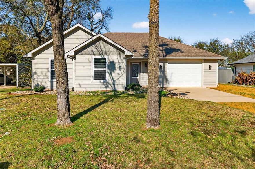 Discover this charming 3-bedroom, 2-bathroom home that’s ready for its next forever family. The bright, open living area flows into a spacious kitchen with plenty of counter space and a clear view of the large backyard, making it easy to stay connected during meals, playtime, or gatherings. Each bedroom features a walk-in closet, and the comfortable primary suite includes its own private bath for added convenience. Outside, the generous backyard is ideal for kids, pets, and weekend barbecues. Just a short walk from Tioga City Park, with it's playground and walking trail, and located in Tioga ISD, this home offers comfort, community, and small-town charm.