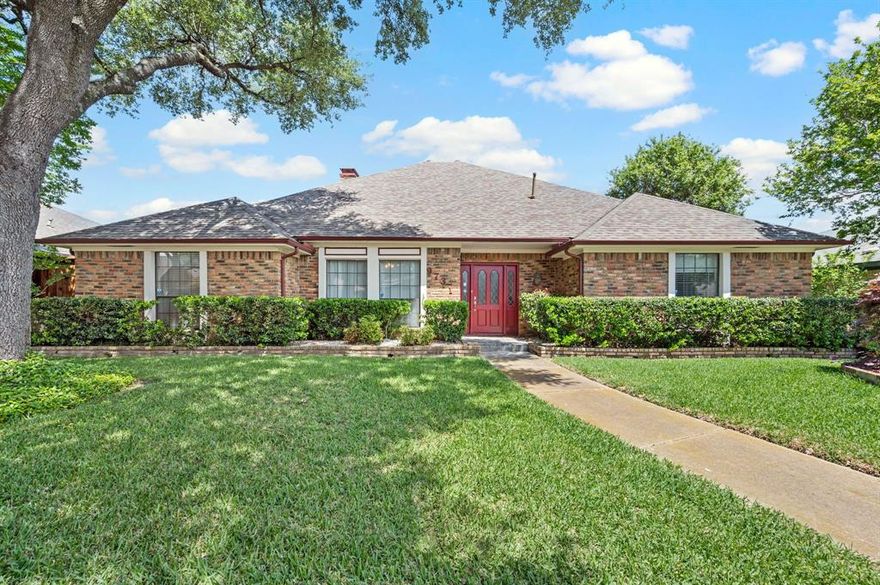 Welcome to this beautiful single-story home tucked away in a quiet neighborhood within Richardson ISD, offering the perfect blend of comfort, style, and privacy. Wood-look flooring flows through the main living areas, complemented by soaring ceilings that create an open and airy feel throughout. The spacious living room features a built-in wet bar, making it ideal for entertaining guests or relaxing at home. The kitchen is a true highlight with stainless steel appliances, granite countertops, painted cabinetry, double ovens, and an electric cooktop, perfectly designed for both everyday living and hosting. The expansive primary suite serves as a private retreat, offering a large bedroom and an impressive ensuite bath. A flexible fourth bedroom provides endless possibilities as a game room, media space, or home office to fit your lifestyle. Step outside to your own private backyard oasis complete with a sparkling pool, spa, and diving pool, along with a covered patio and lush landscaping. Surrounded by an 8+ foot board-on-board fence, the backyard offers exceptional privacy, perfect for entertaining or unwinding. This home truly has it all and is ready to be enjoyed.