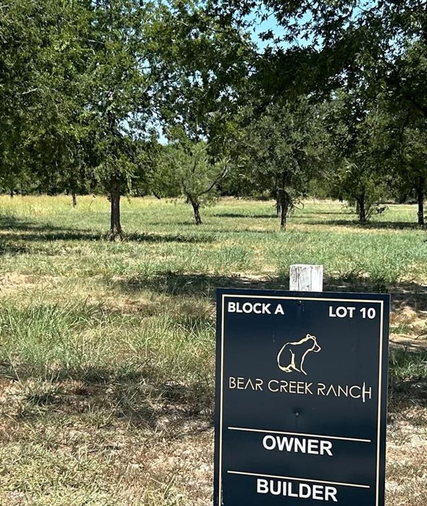One of the few remaining creek lots! 2 Acre luxury estate lot with trees backs up to Bear Creek inside the Bear Creek Ranch gated community in Parker County – No City Taxes - Award-Winning Aledo ISD - Private Water Well & Septic Systems – No Water Bills - Tri-County Electric – Buried Propane Tank Allowed - Any Custom Builder – No Timeframe to Build - Minimum Living Space: 3,500 SF - 90% Exterior Masonry Requirement - Iron or Masonry Fencing Only - HOA Approval Required for all Improvements - Community located adjacent to the historic Moncrief Ranch