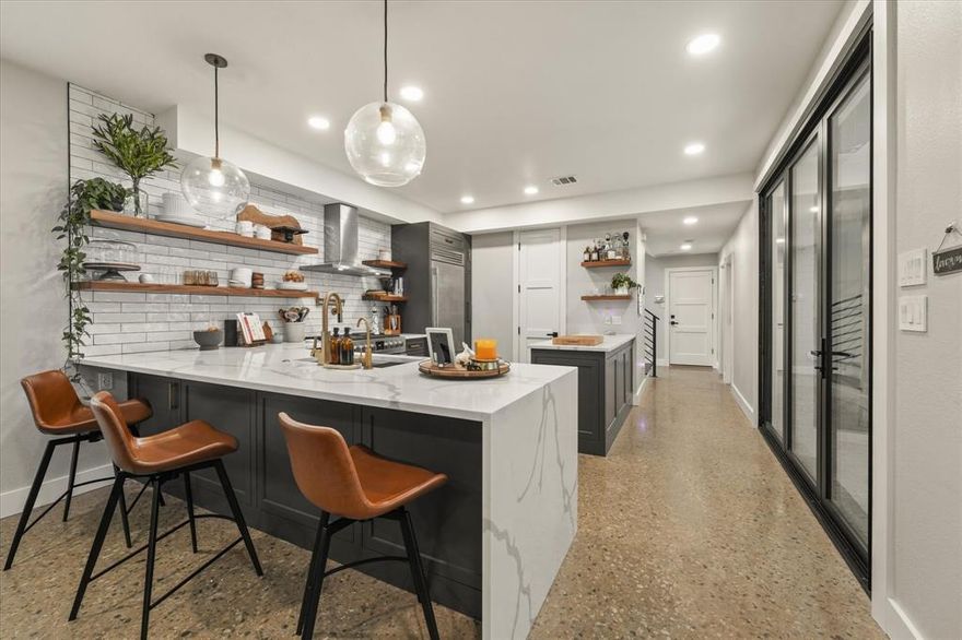 Prime Lower Greenville location with exceptional walkability to dining, nightlife, and entertainment along Lower Greenville and Henderson Avenue. The interior has been fully renovated with a sleek, modern design and open, light-filled layout.

Highlights include polished concrete floors, soaring ceilings, designer lighting, an architectural staircase, and a chef’s kitchen with quartz countertops, custom cabinetry, stainless steel appliances, and a large island. The primary suite offers a spa-inspired bath with soaking tub, glass shower, and walk-in closet. Secondary bedrooms are spacious and versatile.

Additional features include a dedicated utility room, covered patio, private yard, and attached garage. An ideal opportunity to own a move in ready home in one of Dallas’ most vibrant neighborhoods.
Agent & Broker are parties to the transaction