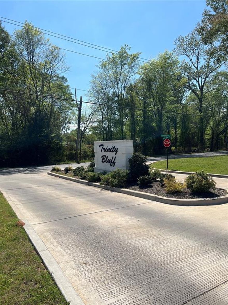 LAST LOT AVAILABLE – NO SIDE OR REAR NEIGHBORS!
Welcome to Trinity Bluff, North Shreveport’s premier state-of-the-art new home community. This is your final opportunity to build in this highly sought-after neighborhood — offering unmatched privacy with no side or rear neighbors. Located just five miles north of downtown Shreveport, you are minutes from exceptional dining, a vibrant arts scene, and year-round riverfront festivals. A quick drive across the Red River brings you to Bossier City, where you’ll find abundant shopping, entertainment, and even more dining options. Outside, take in the unbelievable panoramic views of rural Louisiana farmland from where your home is situated on a bluff and spend time with your family on walks at dusk under solar-powered smart LED street lights. The electric utility’s adjacent solar and battery storage facility adds reliability and resiliency to your power supply. 
Families benefit from the highly regarded Caddo Parish Public Schools, home to 12 National Blue Ribbon Schools of Excellence as designated by the U.S. Department of Education, along with magnet programs at the elementary, middle, and high school levels.